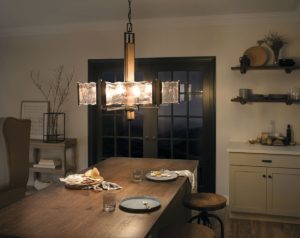 Pendant Lighting Traditional Rustic ABERDEEN Kichler 43895OZ illuminated in the kitchen above the wooden table