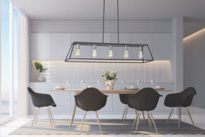 Luminaire suspendu iL 21920-P5 au-dessus d'une table de cuisine en bois avec un décor moderne blanc