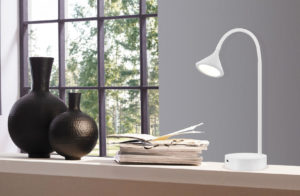 Modern pendant lighting ORMOND Eglo 202278A on a work desk near the window with decorative objects and books
