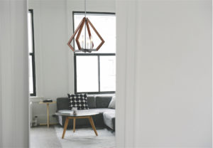 Pendant Lighting Modern Ulextra P560-8-CM in the living room above the coffee table near the window