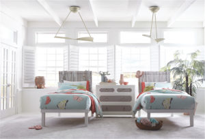 Ceiling fan KYTE 300254NI7 bove the beds in a seaside style bedroom with shutters and plants white